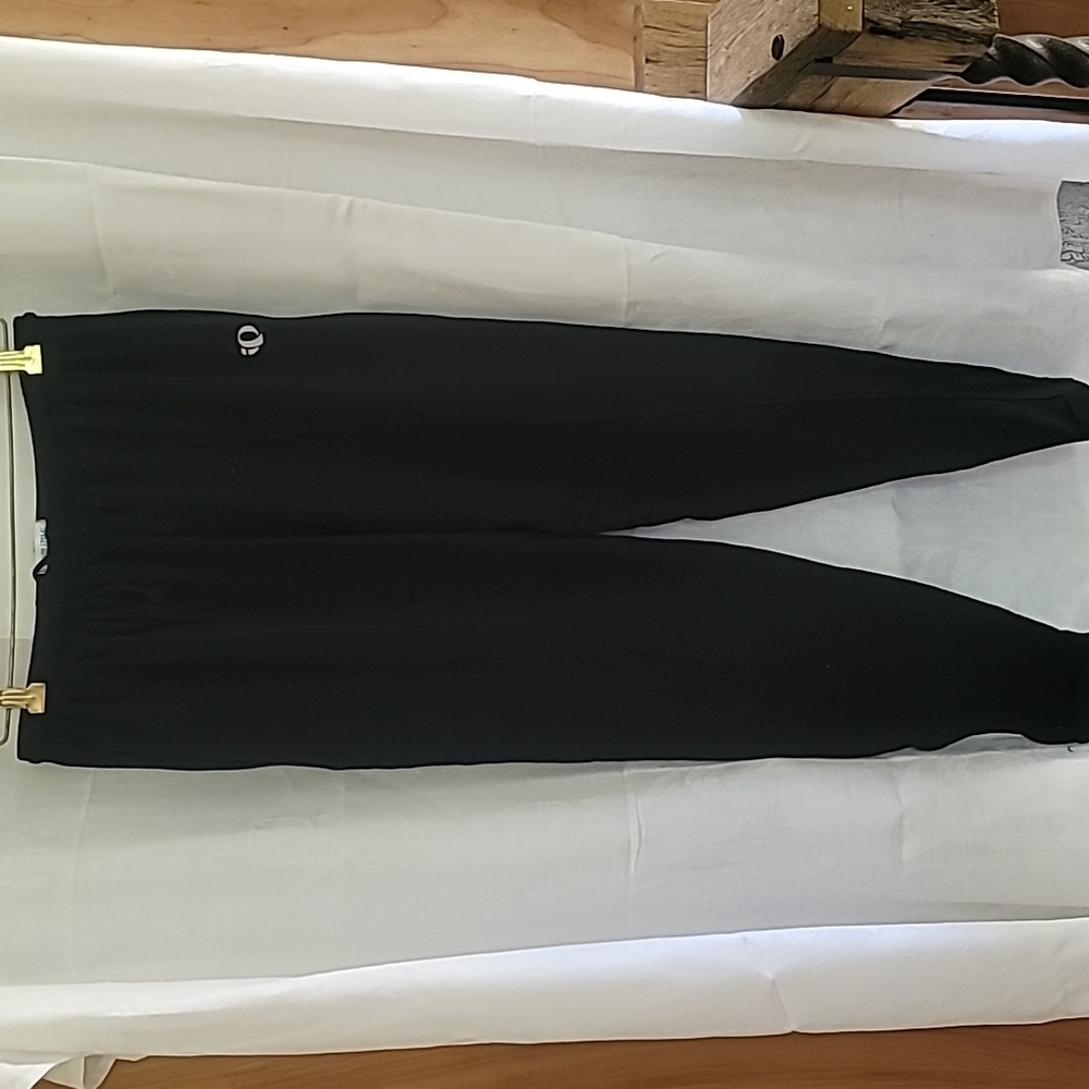 A pair of lightweight active wear pants, black size M
